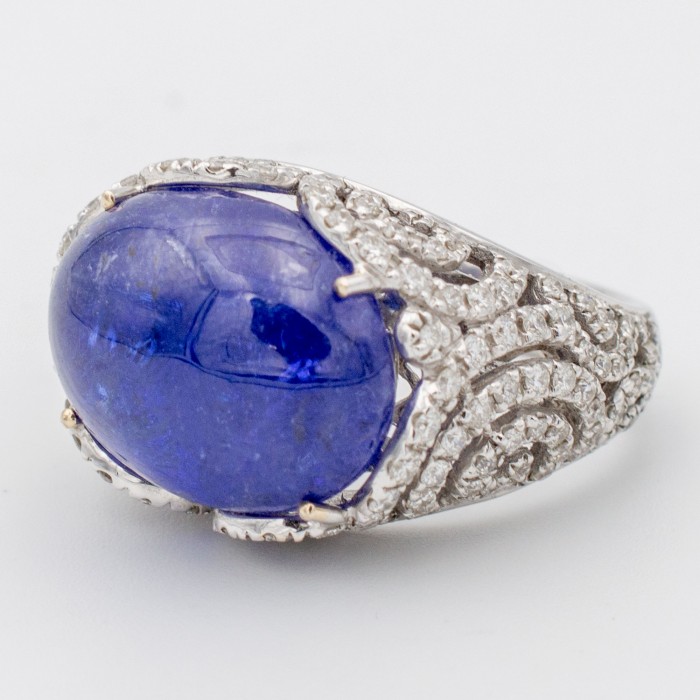 Anello tanzanite cabochon Ct.14,74 e diamanti in oro 18Kt