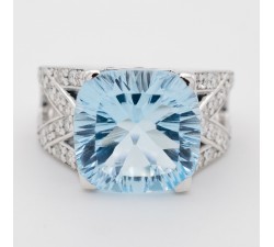 Anello topazio azzurro e diamanti in oro 18Kt