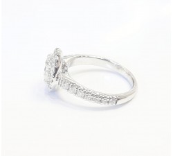 Anello Solitario CT 0,85 con Ghiera Diamanti CT 0,46 in Oro 18kt