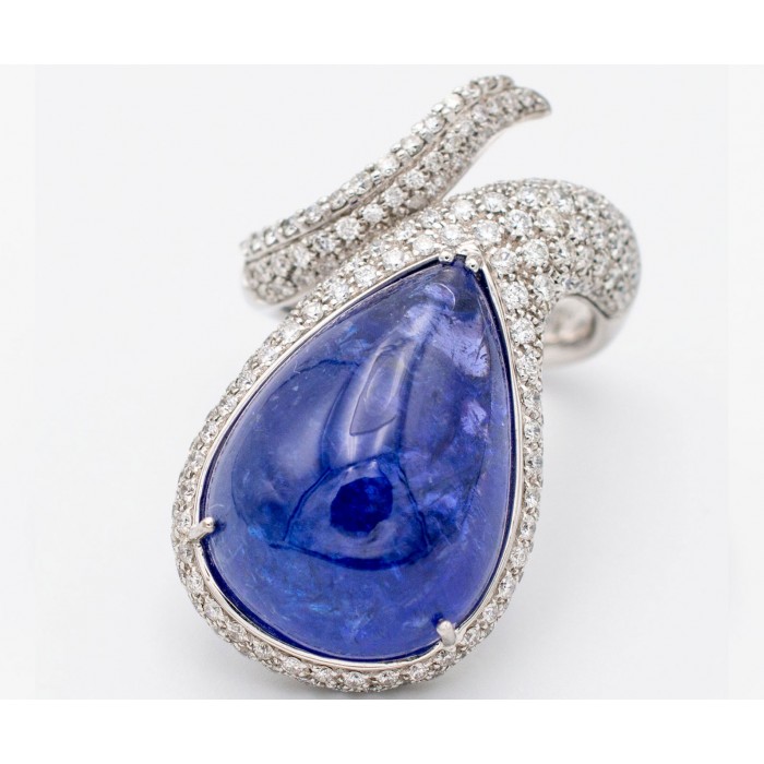 Anello tanzanite cabochon e diamanti in oro 18Kt