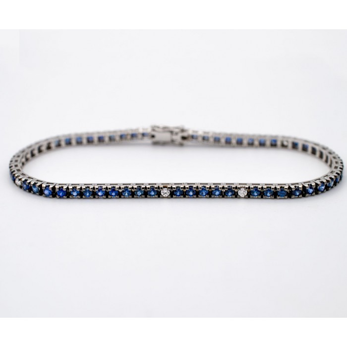 Bracciale Tennis Zaffiri Blu Ct. 4,00 e Bianchi Ct.0,28 in oro 18Kt